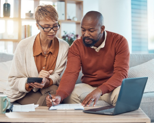 Couple looking at finances together