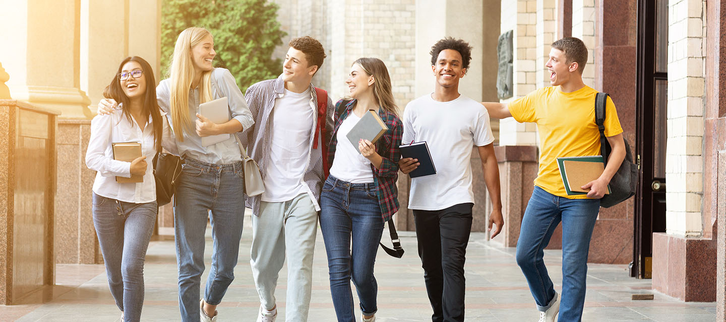 Group of college students walking to class