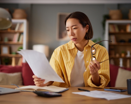 Woman reading her financial statement