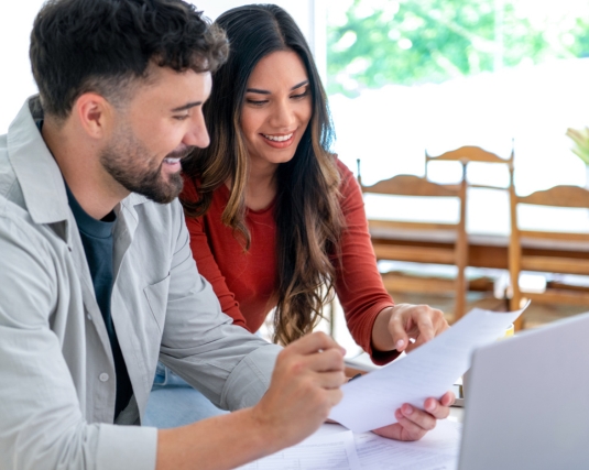 Finance, documents and senior couple on sofa with bills, paperwork and insurance checklist in home, life or asset management