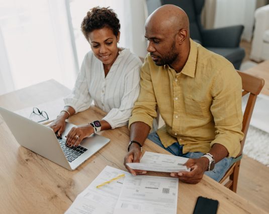 Couple working on budget plans