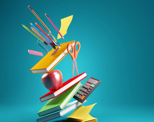 colorful school supplies floating up