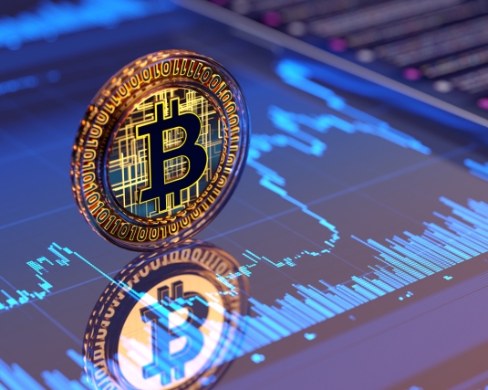 Bitcoin sign - business graph background. Crypto concept - market volatility. stock photo