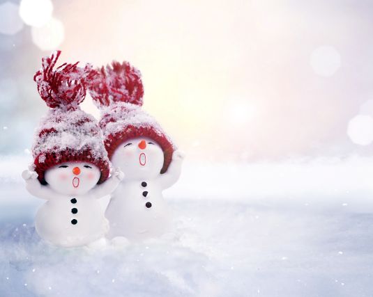 two snowmen singing with a holiday, winter background